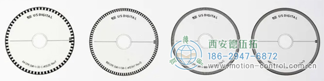 上圖顯示了四個具有不同行數的光電編碼器盤，可以觀察到行的密度不同。